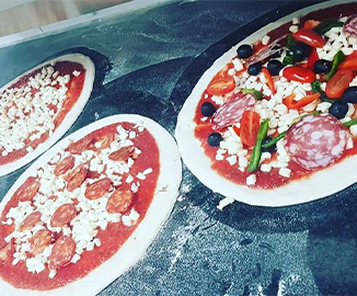 Pizzas being prepared at Panpizza